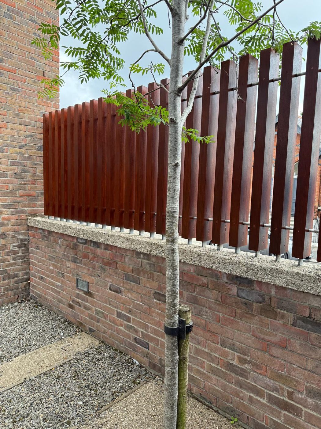 Fence on Brick Wall — JAID job